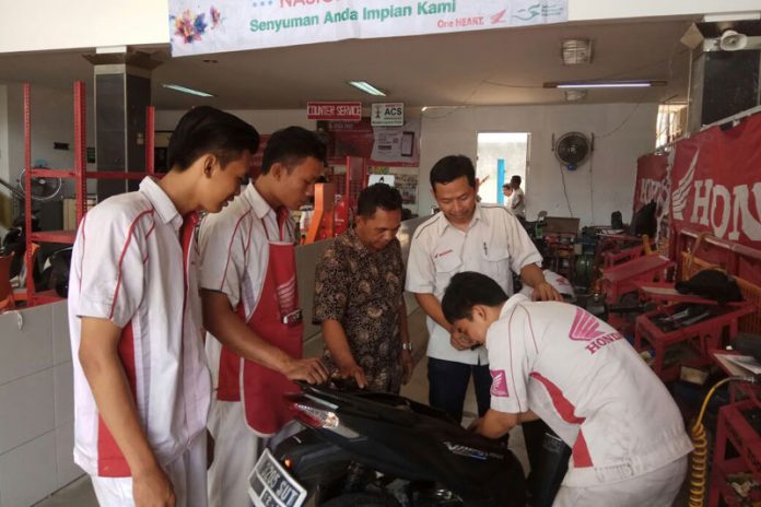 Pasar Spare Part Naik 17 Persen, bengkel resmi AHASS