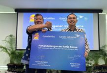 Garuda Indonesia dan TOP 1 Perluas Ekosistem GarudaMiles untuk Aktivitas Mobilitas Pelanggan